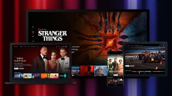 Person streaming movies on laptop